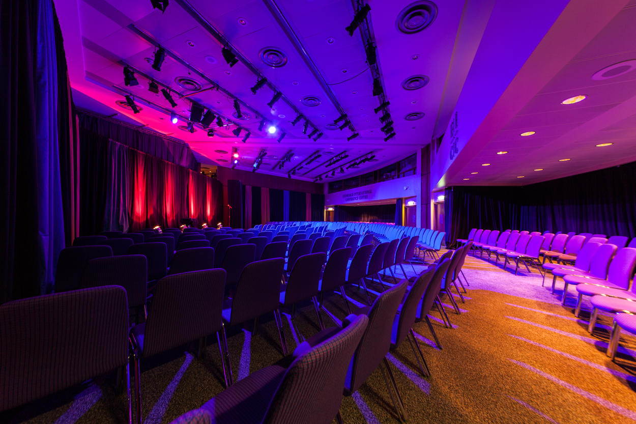 Lomond Suite conference space in Edinburgh with vibrant lighting and seating arrangement.