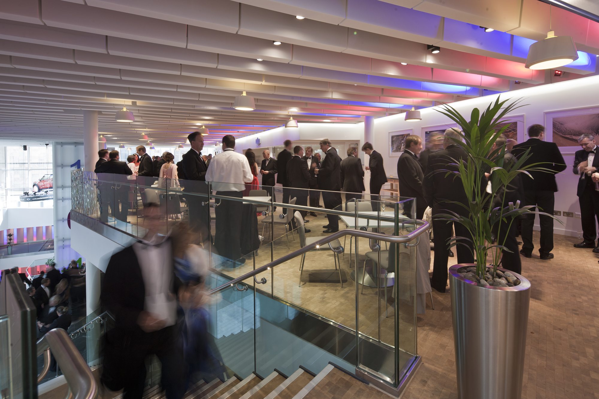Atrium at Edinburgh Conference Centre, vibrant networking event with stylish decor.