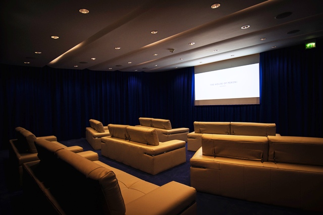 Wolfson Conference Suite: modern meeting space with projection screen for workshops and conferences.