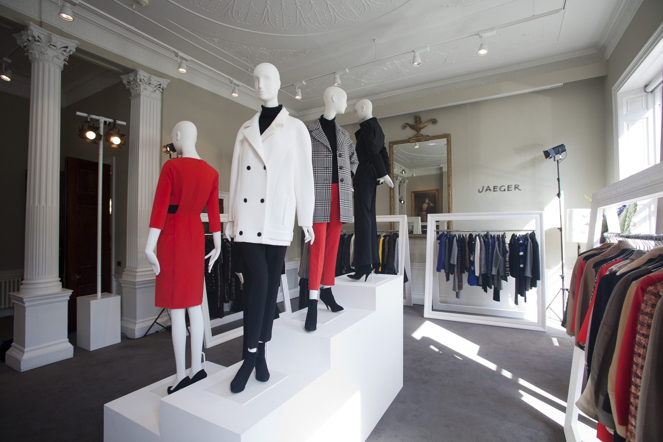Chic fashion display with mannequins at 41 Portland Place for a trunk show.