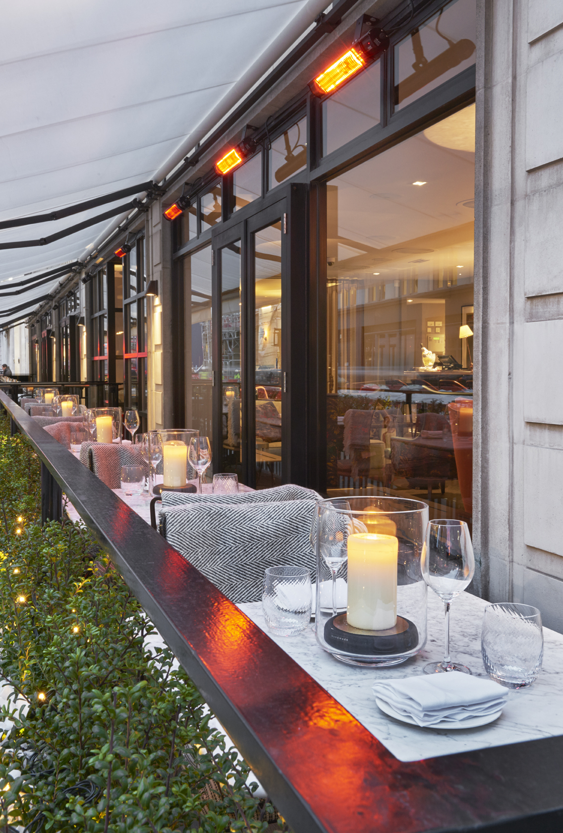 Elegant outdoor dining area at Sartoria, perfect for upscale events and intimate gatherings.