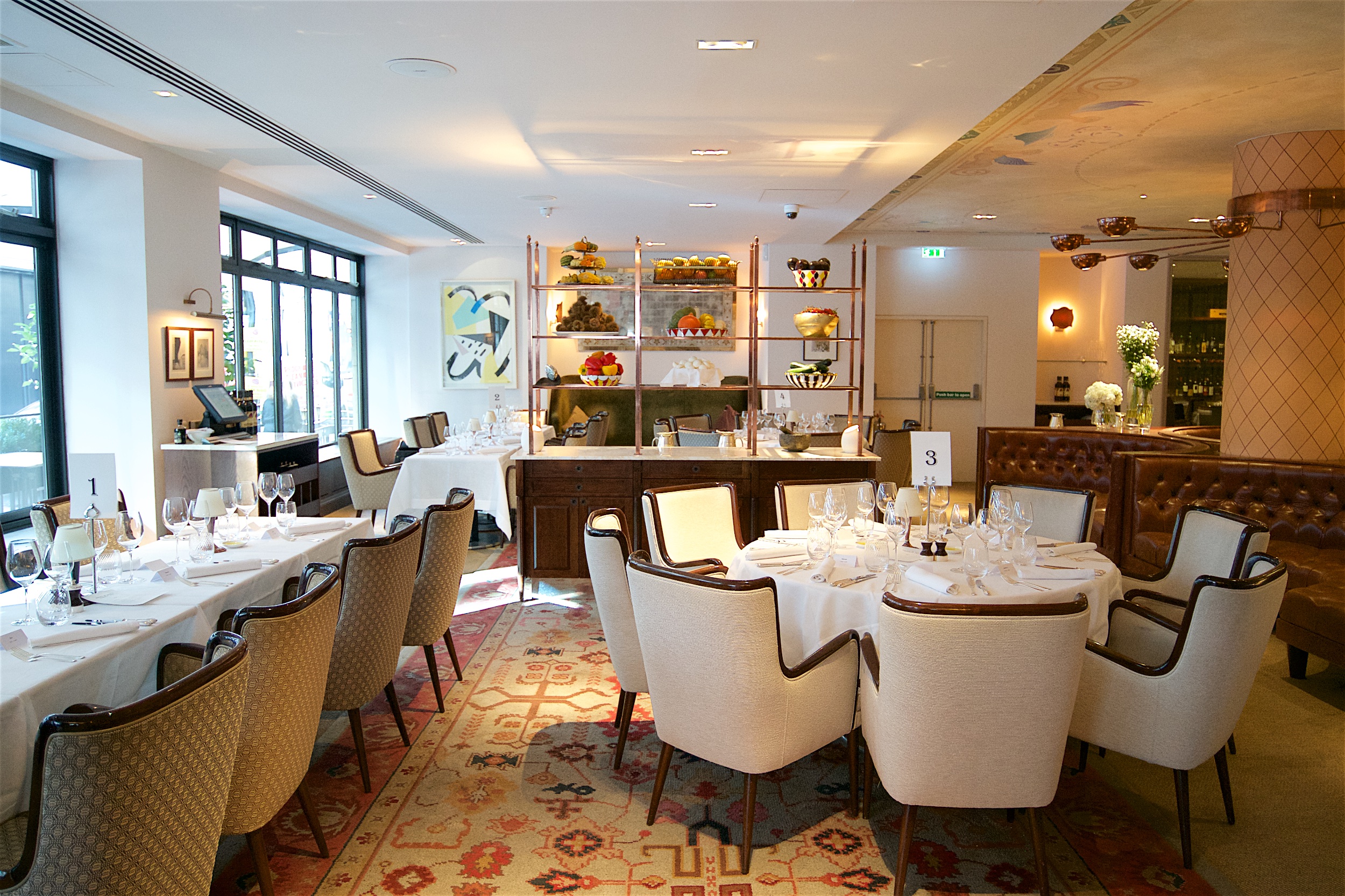 Sophisticated dining venue in Sartoria, ideal for corporate dinners and intimate events.