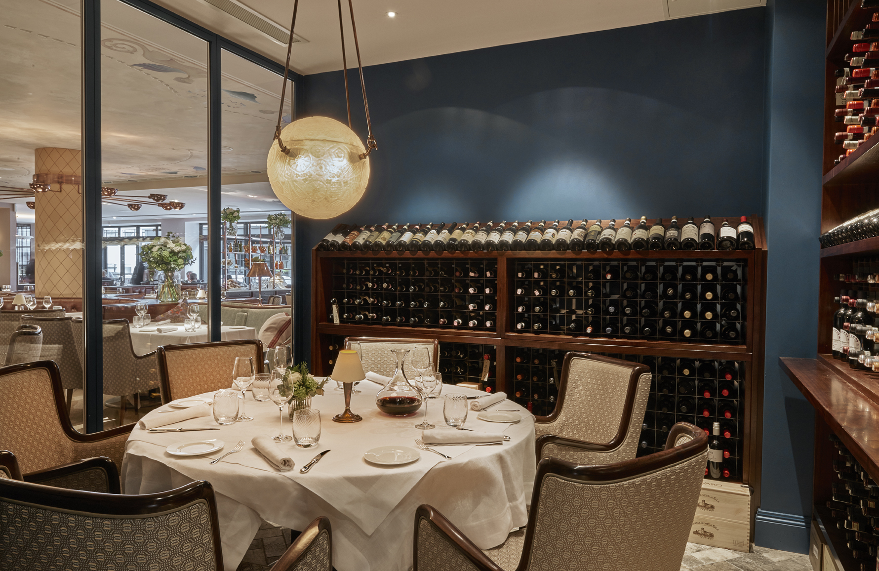 Elegant dining venue with round table, ideal for corporate dinners and private events.