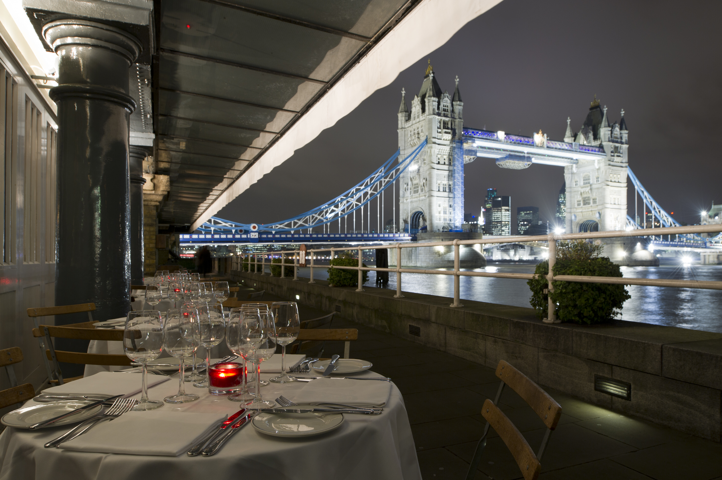 Elegant outdoor dining at Butlers Wharf Chop House with Tower Bridge view, perfect for events.