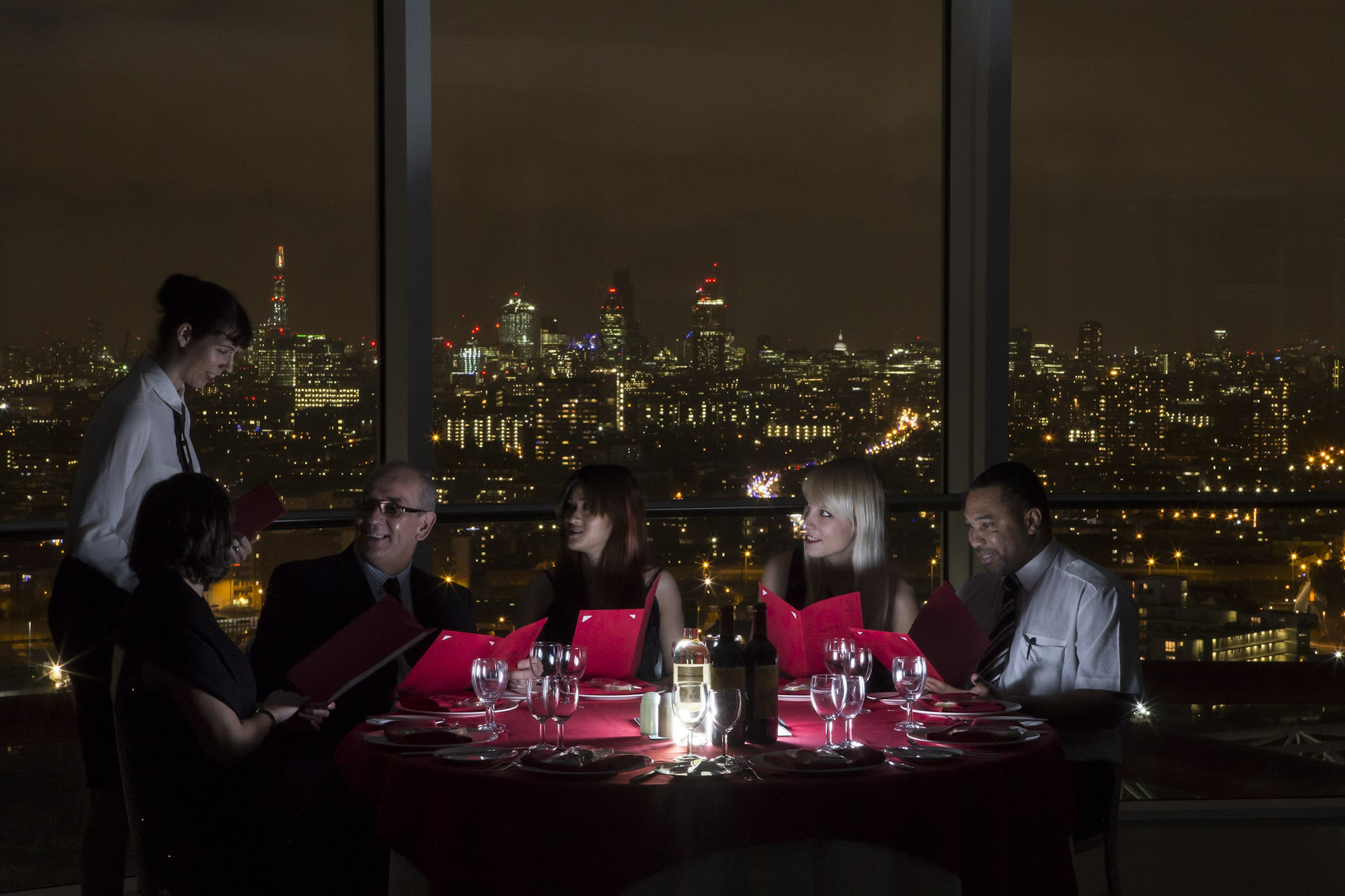 ArcelorMittal Orbit dining setup with city skyline, perfect for corporate events and private dinners.