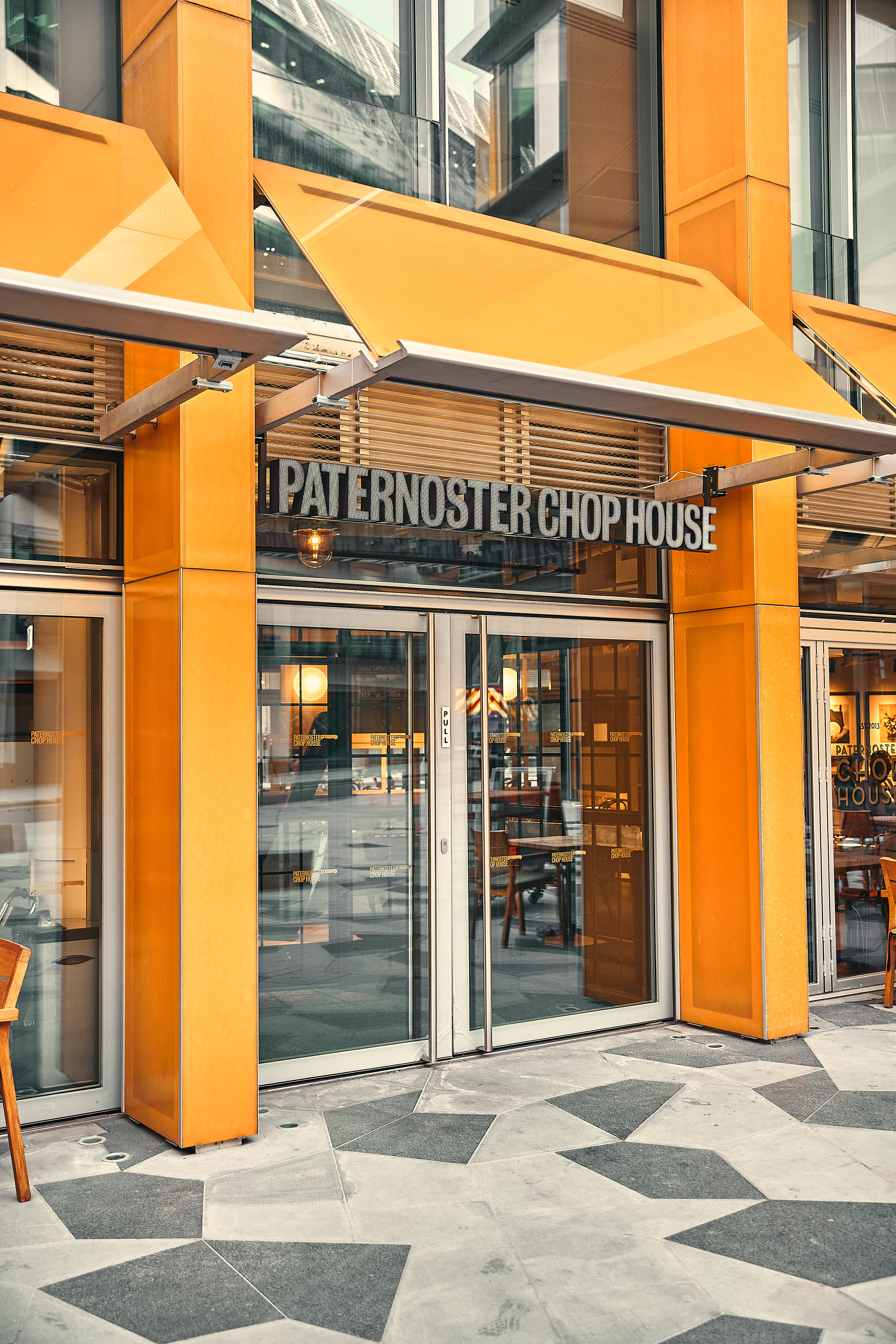 Paternoster Chop House entrance, modern venue for corporate events and meetings.