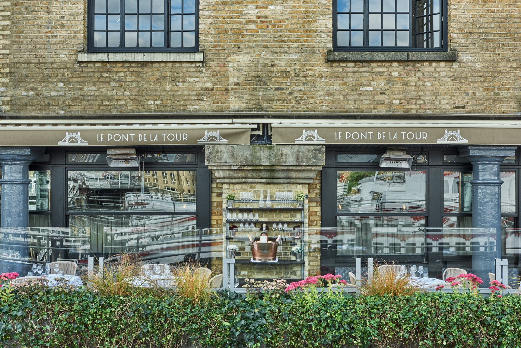 Stylish venue with waterfront view, perfect for upscale corporate events and celebrations.