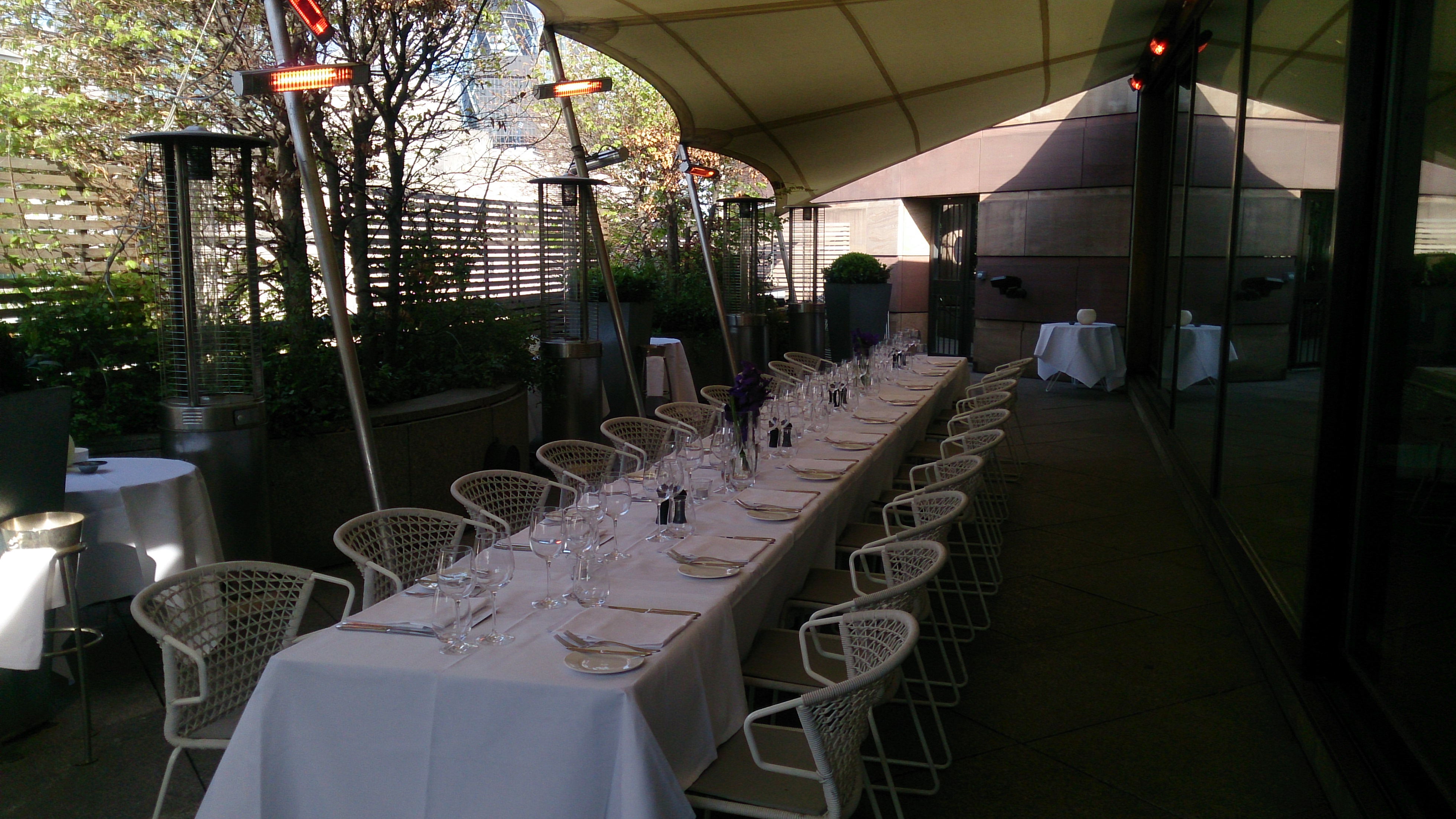 Elegant outdoor dining at Bar Terrace, Coq d'Argent for sophisticated events.