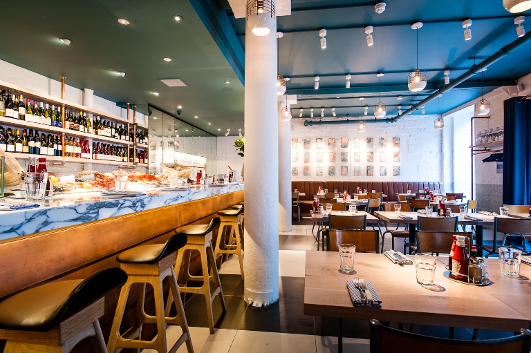 Modern restaurant venue in Fish Market, ideal for networking events and team lunches.
