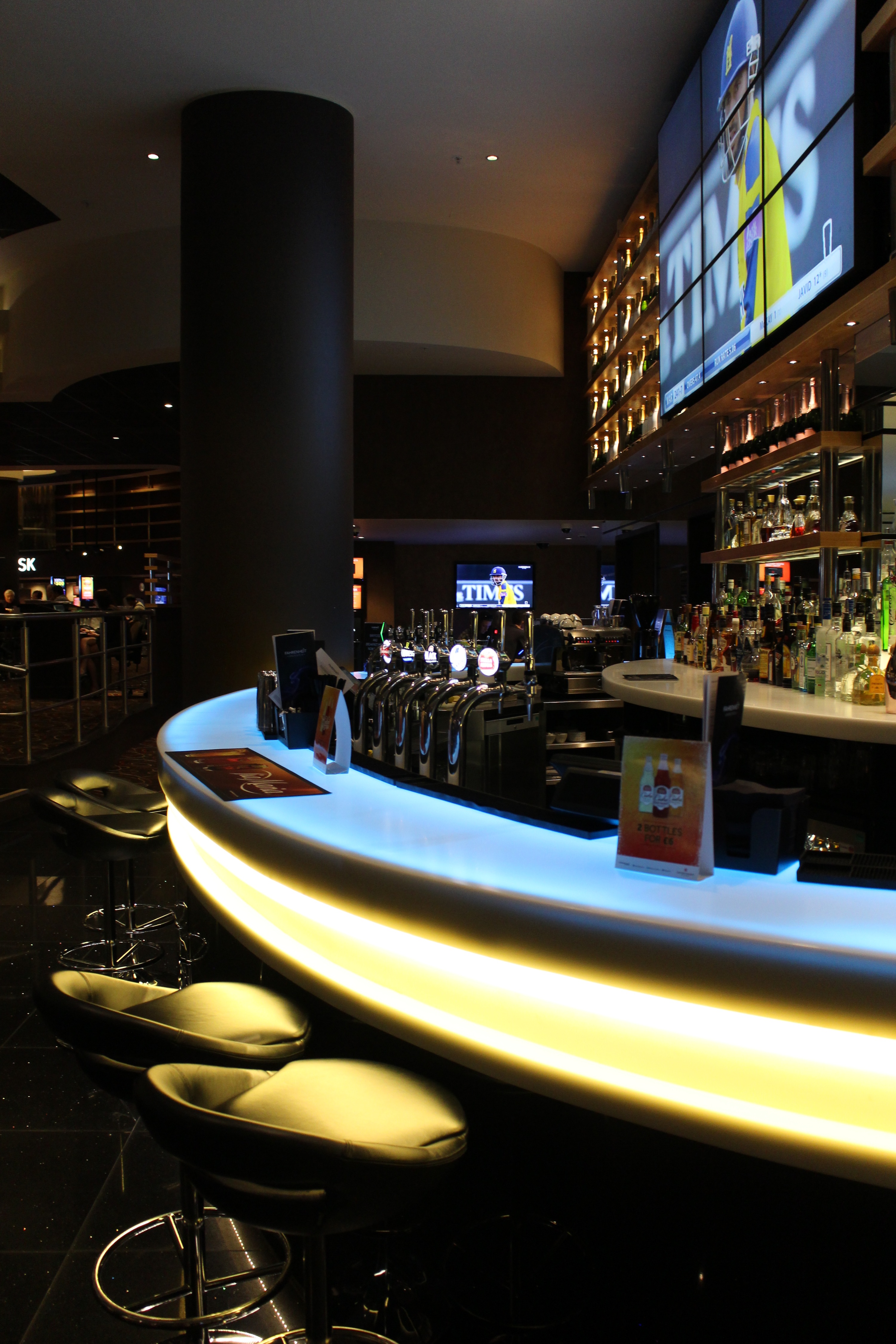 Sleek bar area in Genting Club Manchester for networking events and gatherings.