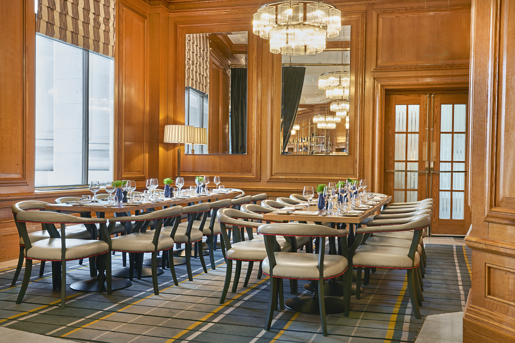 Gillray's Steakhouse meeting space with elegant wooden paneling, ideal for corporate events.