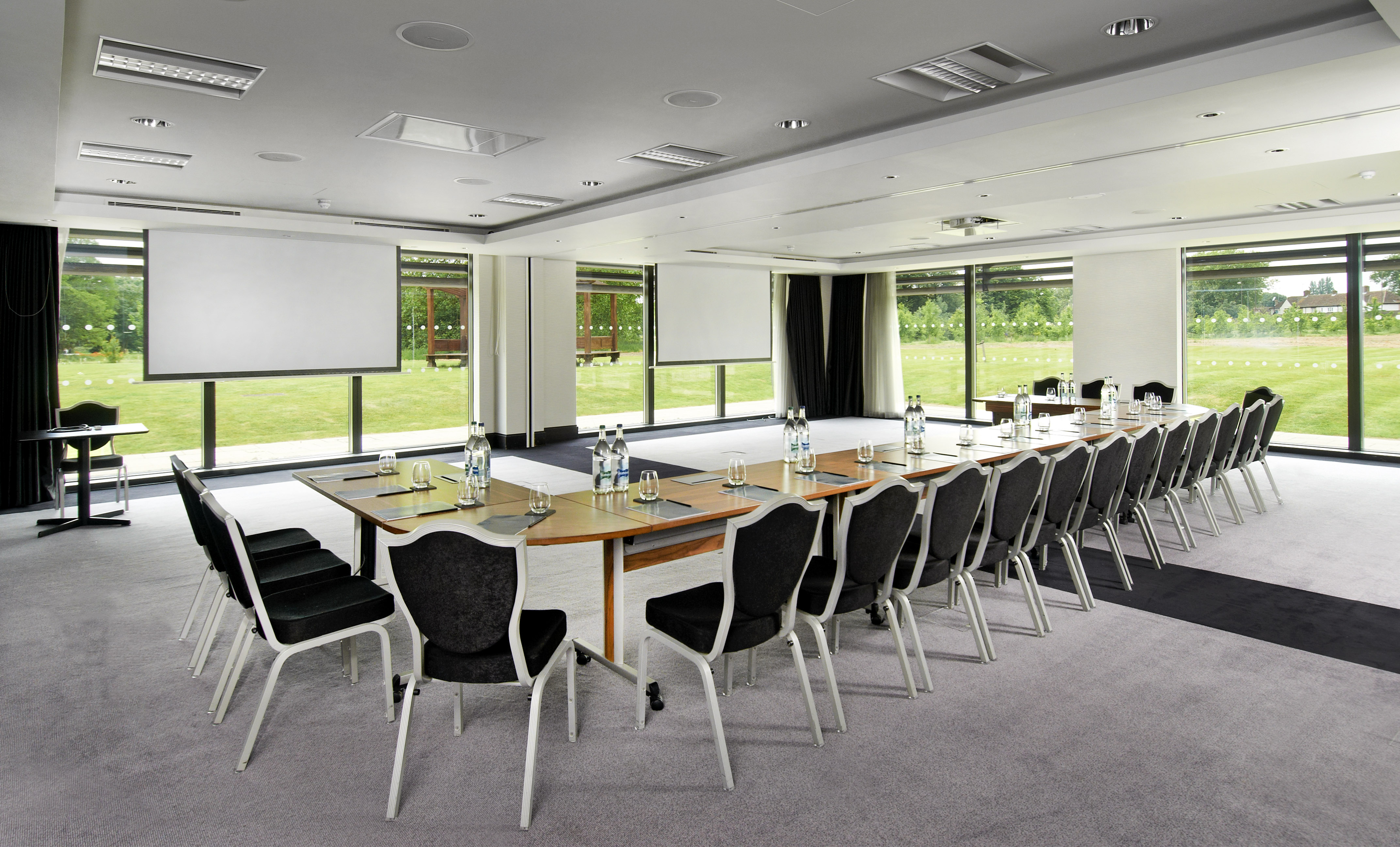 Modern meeting room at Hilton London Syon Park, ideal for corporate workshops and events.