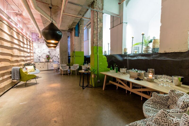 Private room at The Folly Bar, stylish seating for networking events and gatherings.