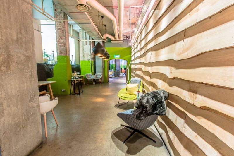 Private room at The Folly Bar with modern decor, ideal for meetings and events.