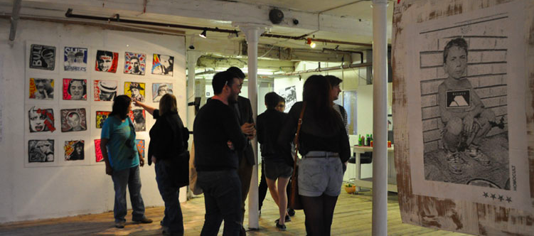 Art exhibition at Kraak Gallery's vibrant venue space with unique decor.