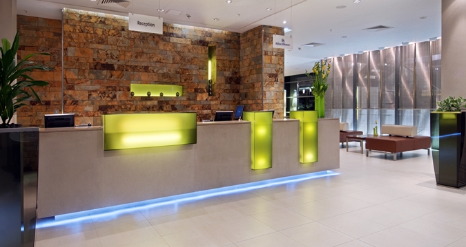 Quayside suite reception at Hilton London Canary Wharf, modern design for corporate events.