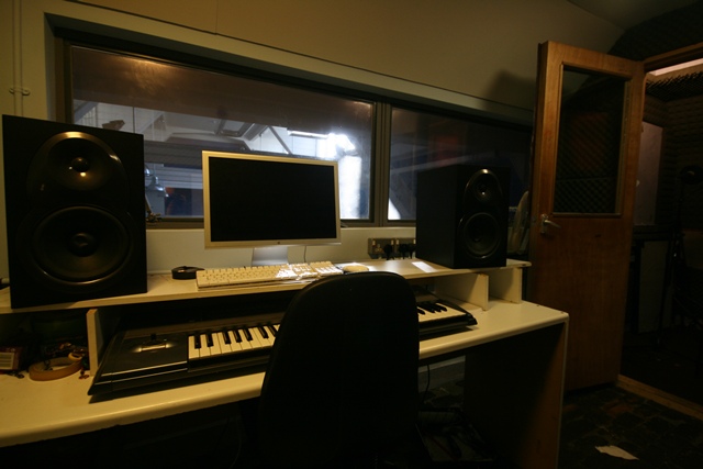 Recording studio at The Harrow Club with soundproofing for music workshops and sessions.