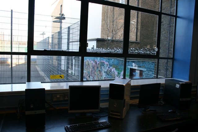 I.T. Suite at The Harrow Club with computers and large window for events and meetings.