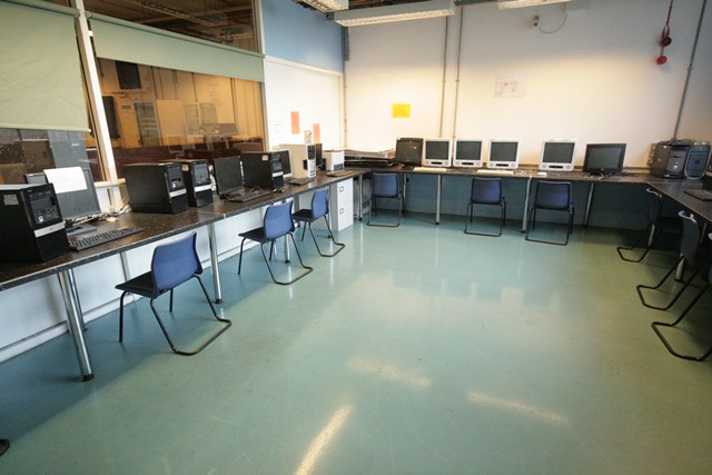 I.T. Suite at The Harrow Club, featuring desktop computers for tech workshops and training.