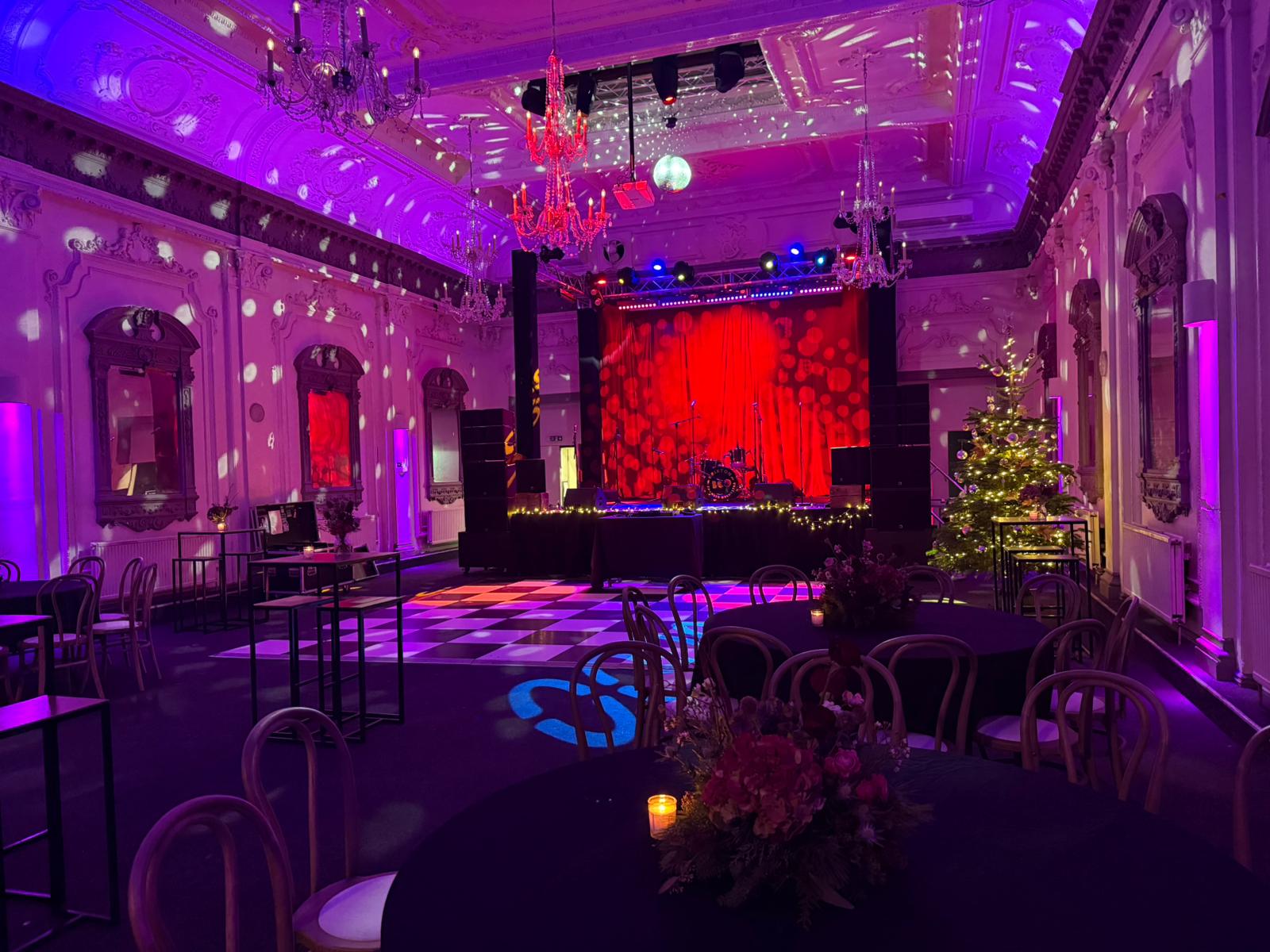 Elegant event space in Bush Hall with vibrant lighting for celebrations and gatherings.