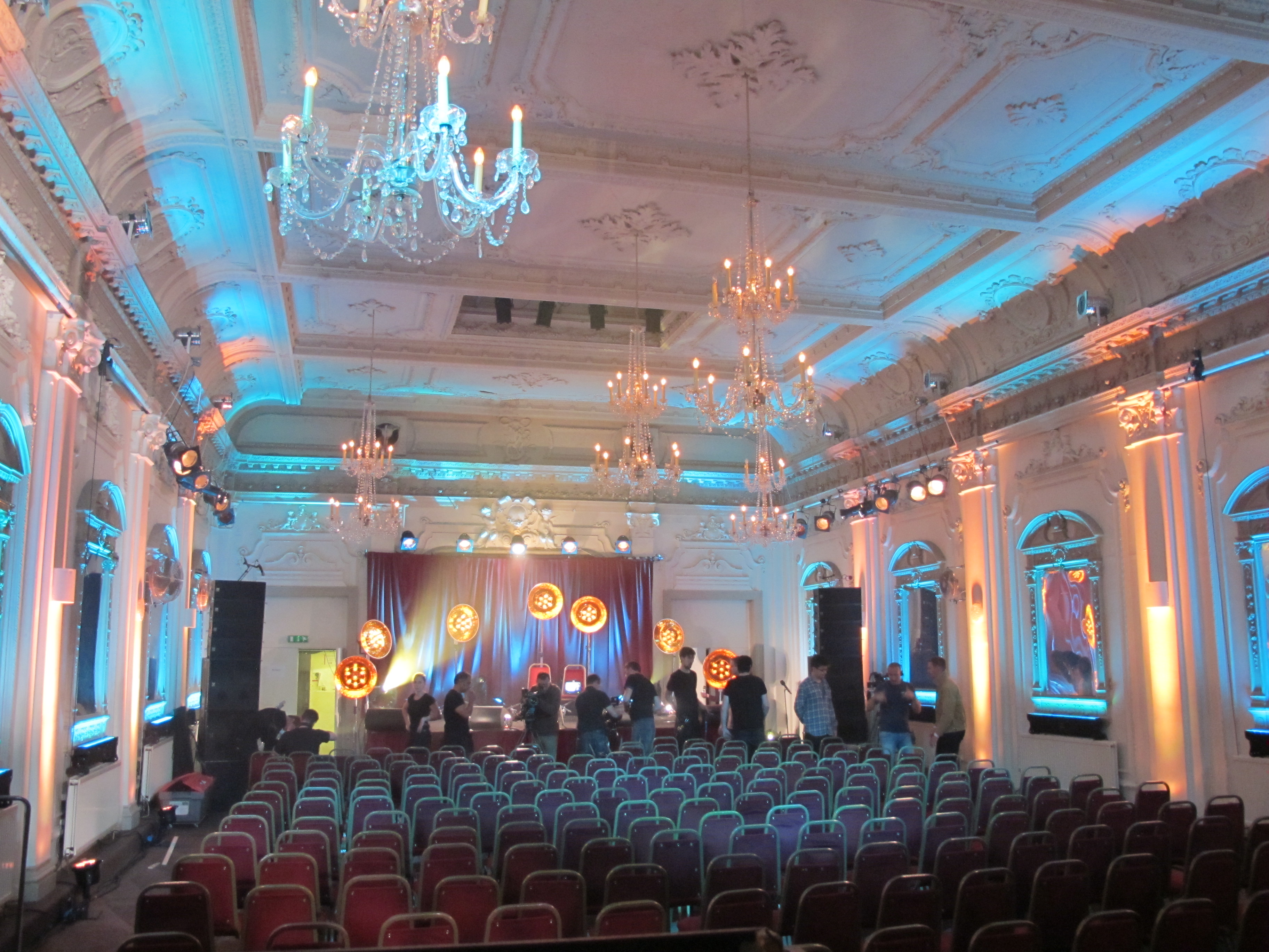 Elegant Bush Hall venue with chandeliers, perfect for presentations and events.