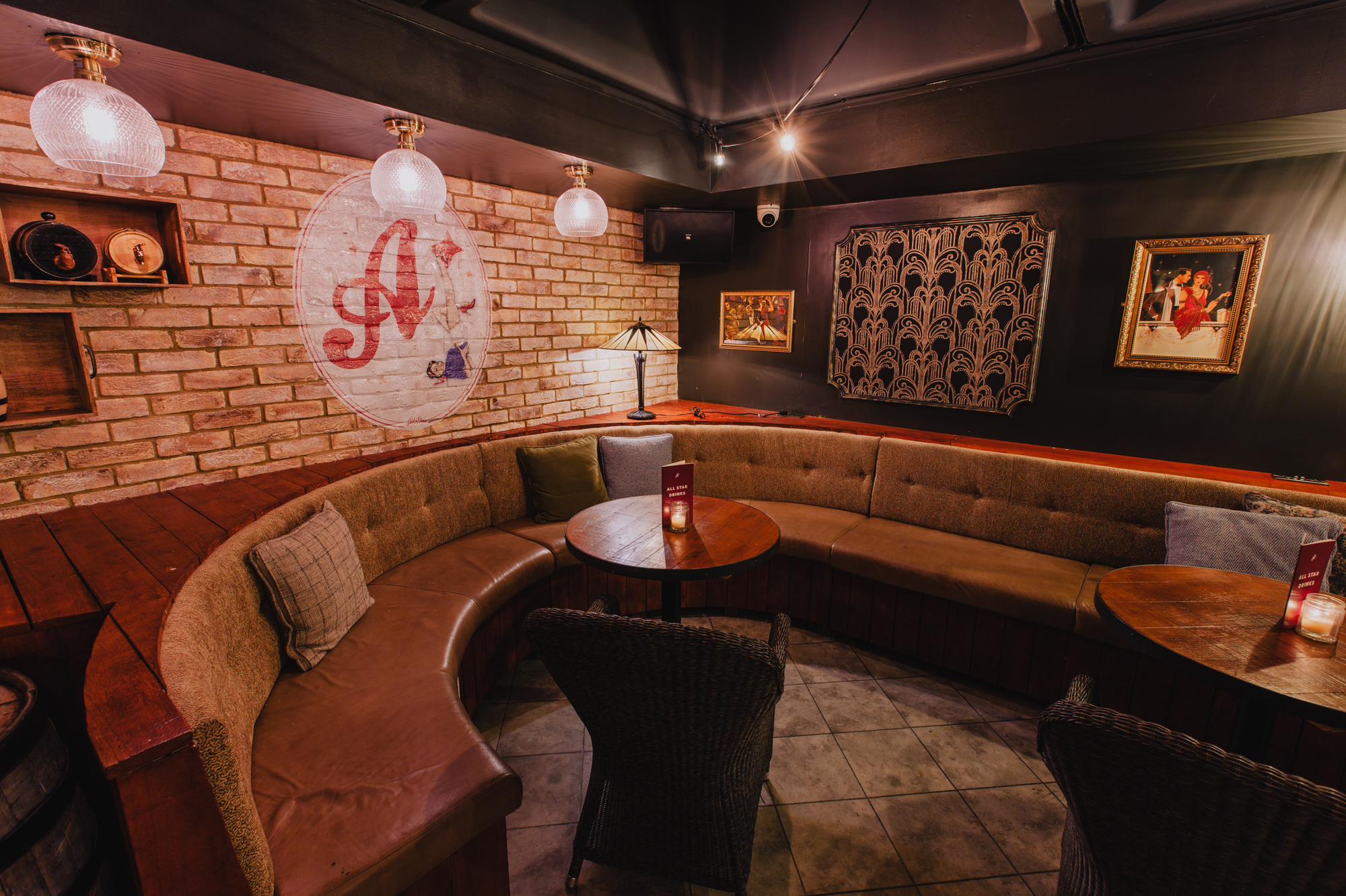 Cozy lounge at All Star Lanes, perfect for networking events and gatherings.