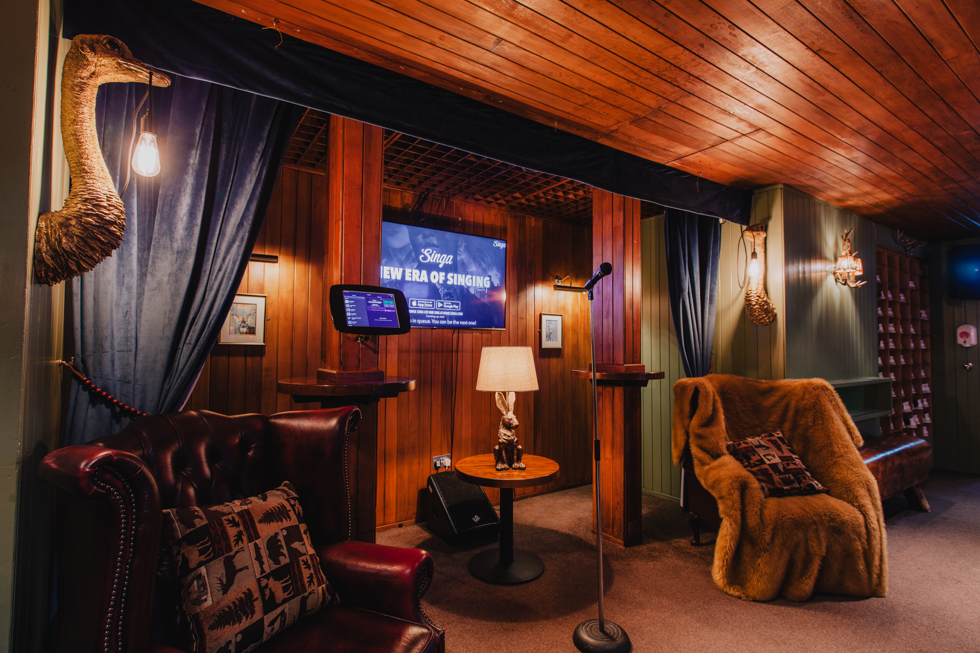 Cozy event space at The Lodge, All Star Lanes - Holborn, perfect for networking gatherings.