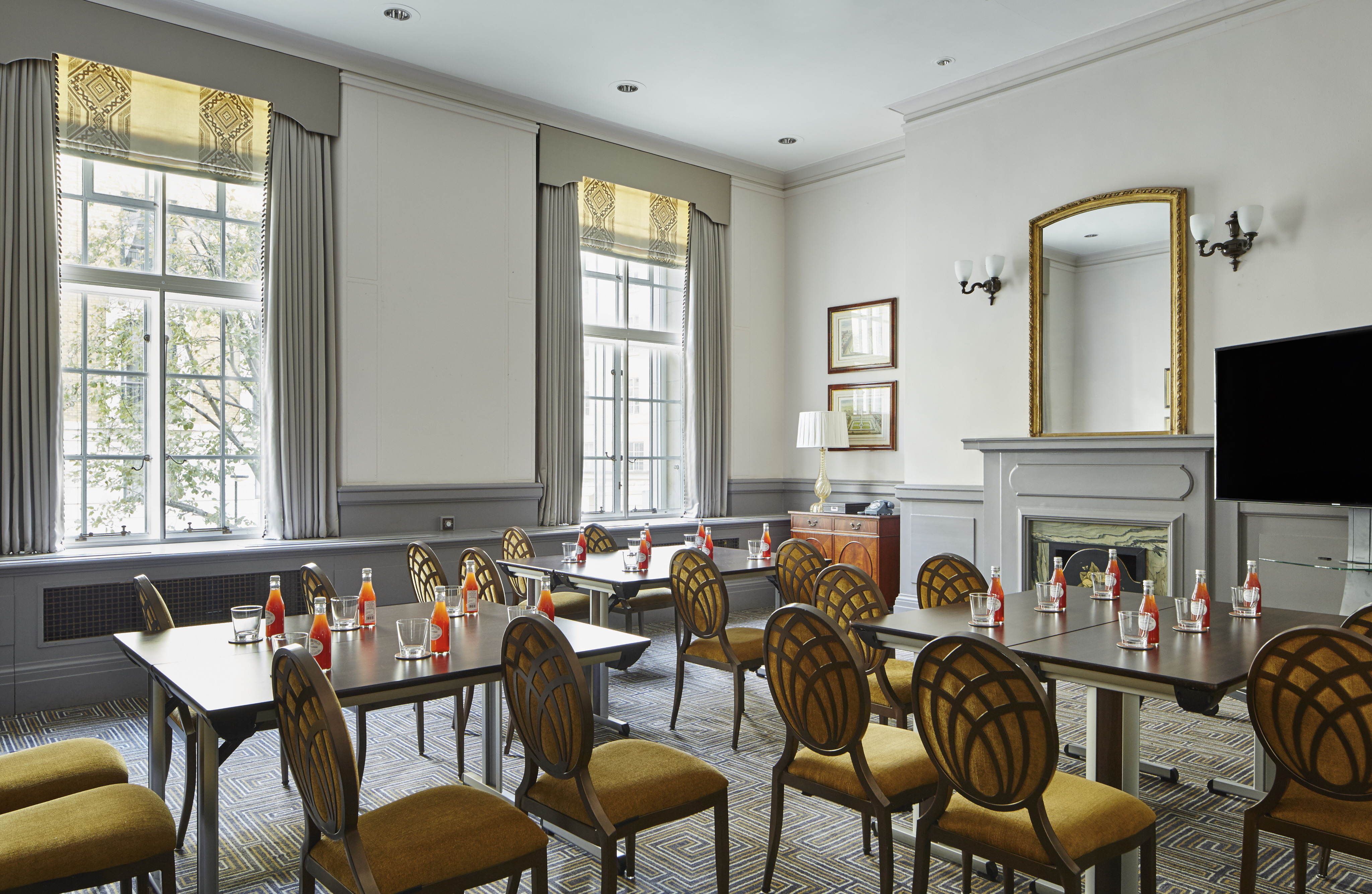 Horace Cutler in a bright corporate meeting room at London Marriott Hotel County Hall.