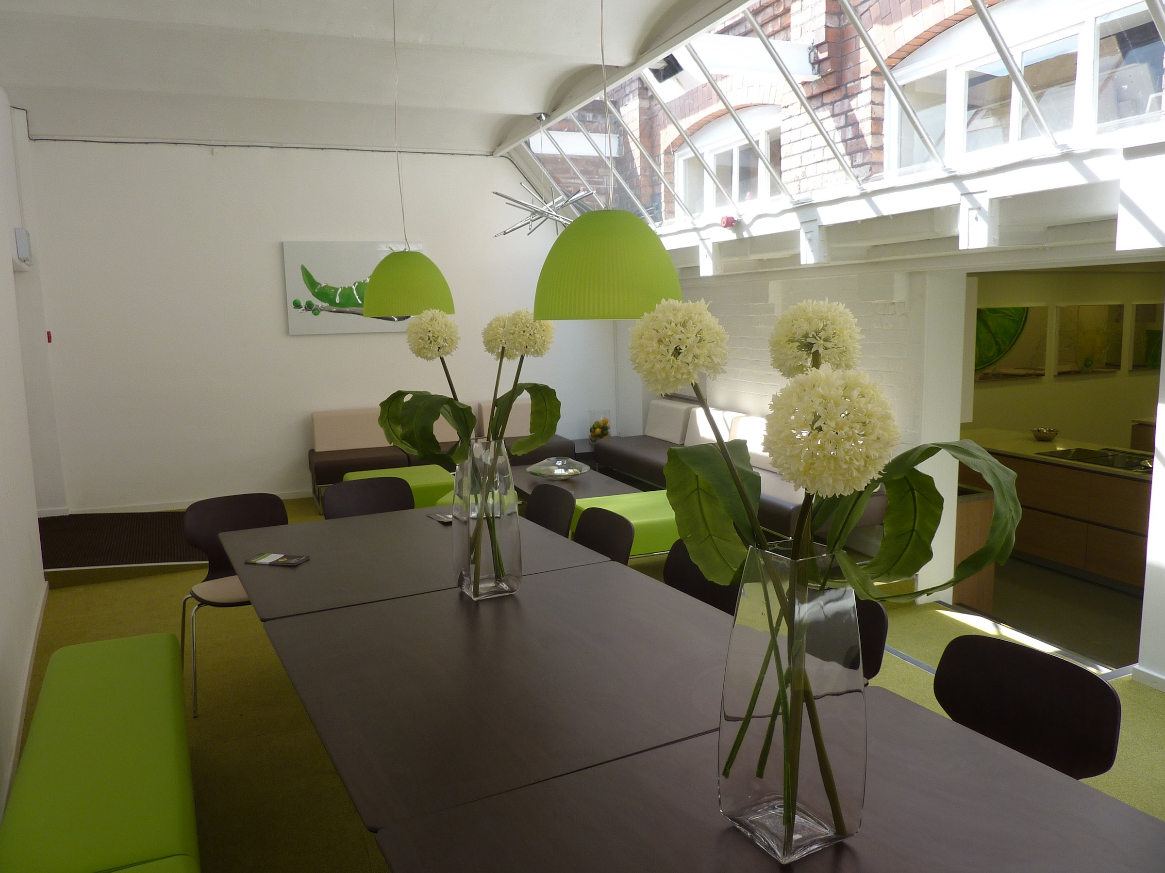 Modern meeting room with long table, ideal for creative sessions at Cheshire Cookery School.