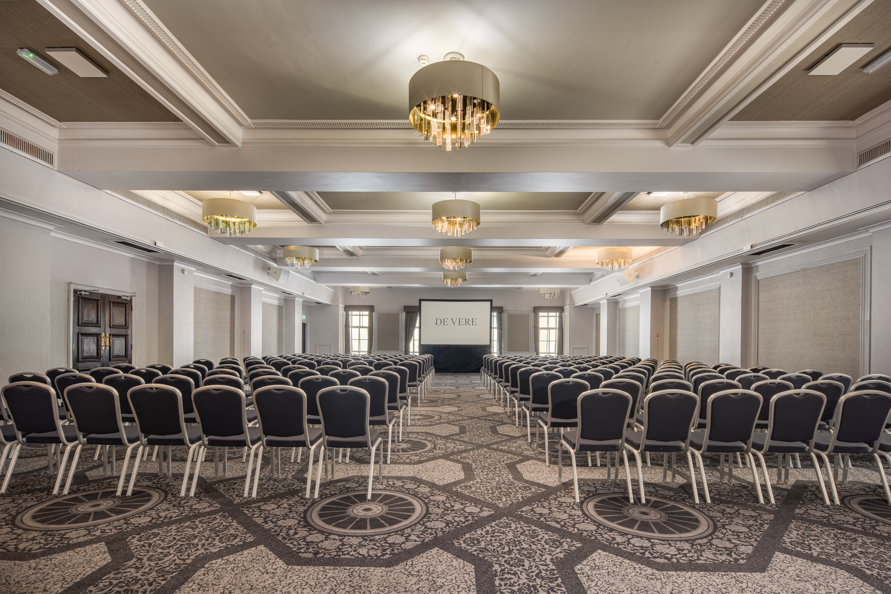 Grand Connaught Rooms ballroom in theater setup for corporate presentations and seminars.