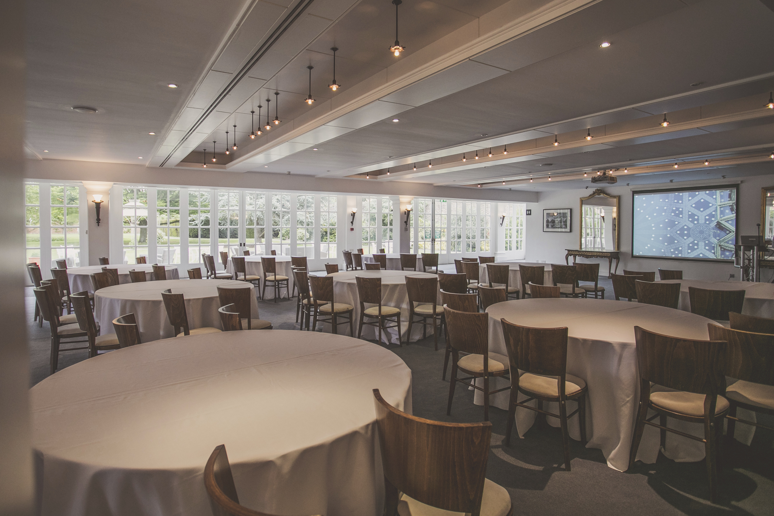 Elegant event space in The Garden Room, Hampton Court Palace, ideal for meetings and banquets.