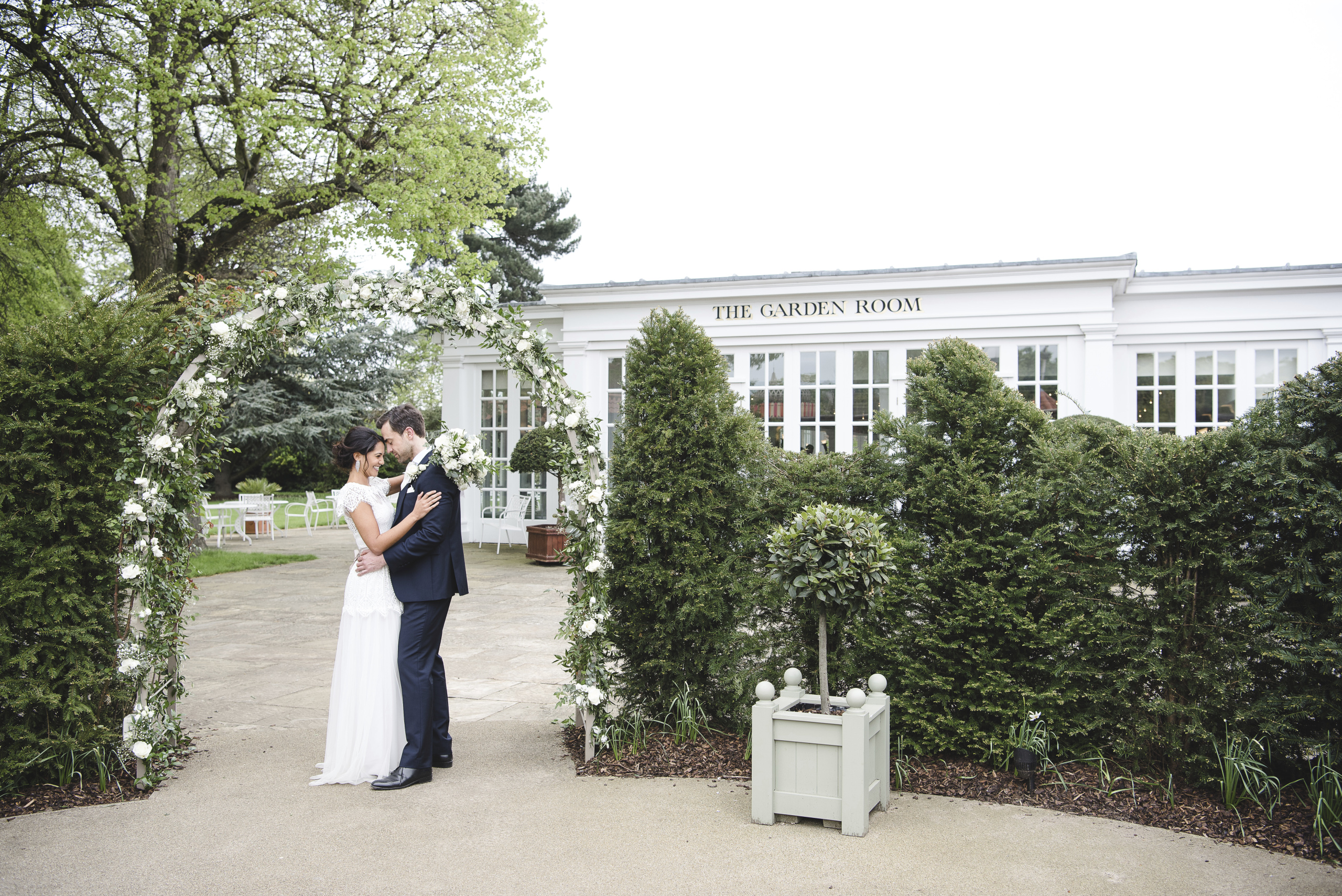 Garden Room at Hampton Court Palace, floral archway, ideal for weddings and events.