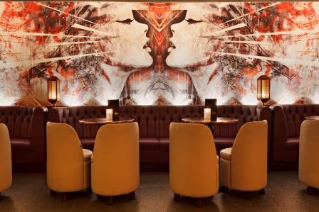 Stylish event space at Dirty Martini Monument with striking mural for cocktail receptions.