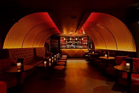 Cocktail cabinet in stylish venue for upscale networking and social events.