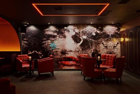 Cocktail cabinet in stylish lounge, ideal for networking events and gatherings.