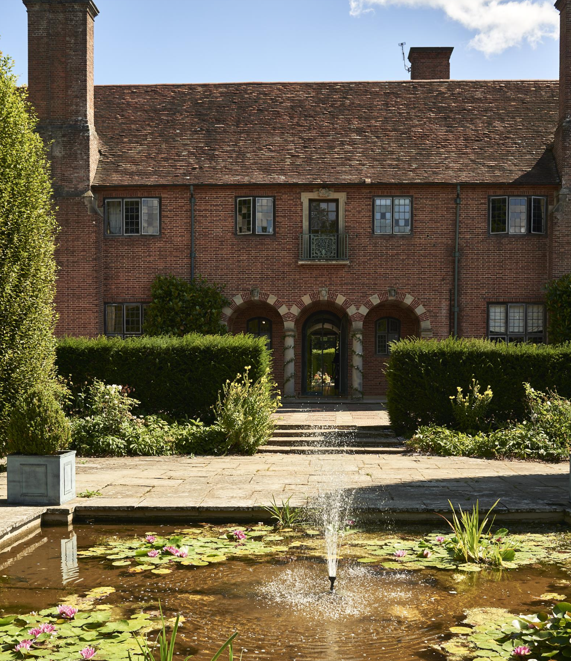 Charming brick venue at Port Lympne Hotel, perfect for events and gatherings.