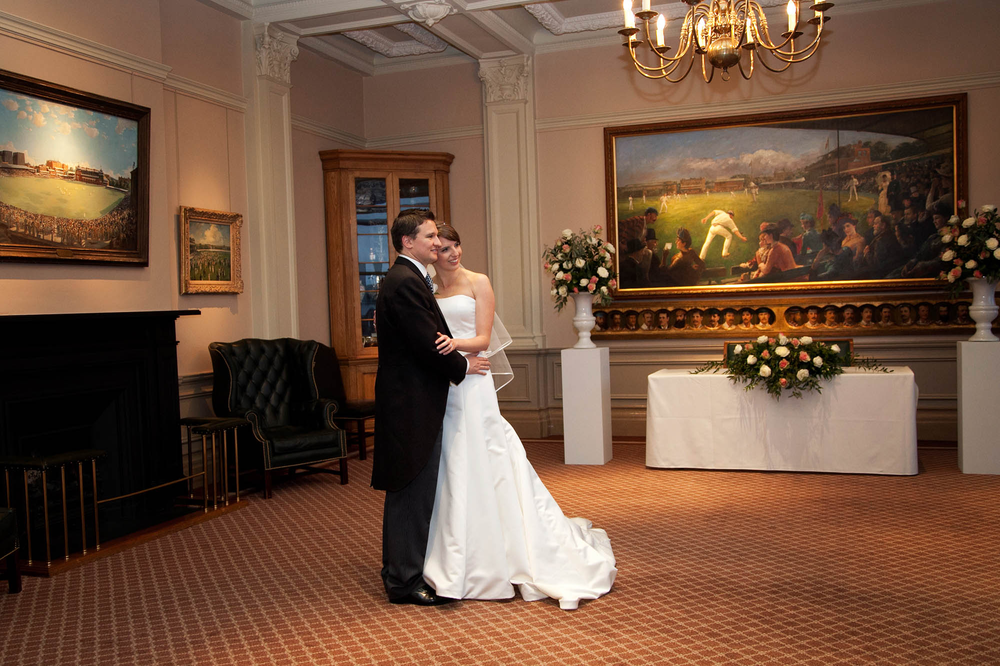 Elegant wedding venue at Lord's Cricket Ground with floral decor and a romantic atmosphere.