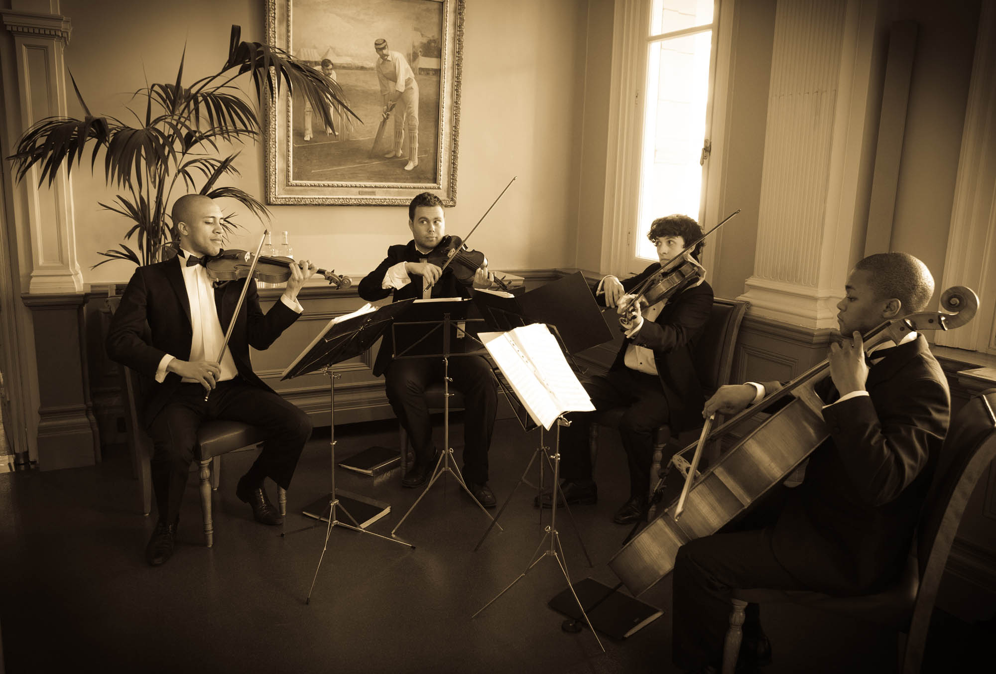 String quartet performing in Long Room, Lord's Cricket Ground for upscale events.