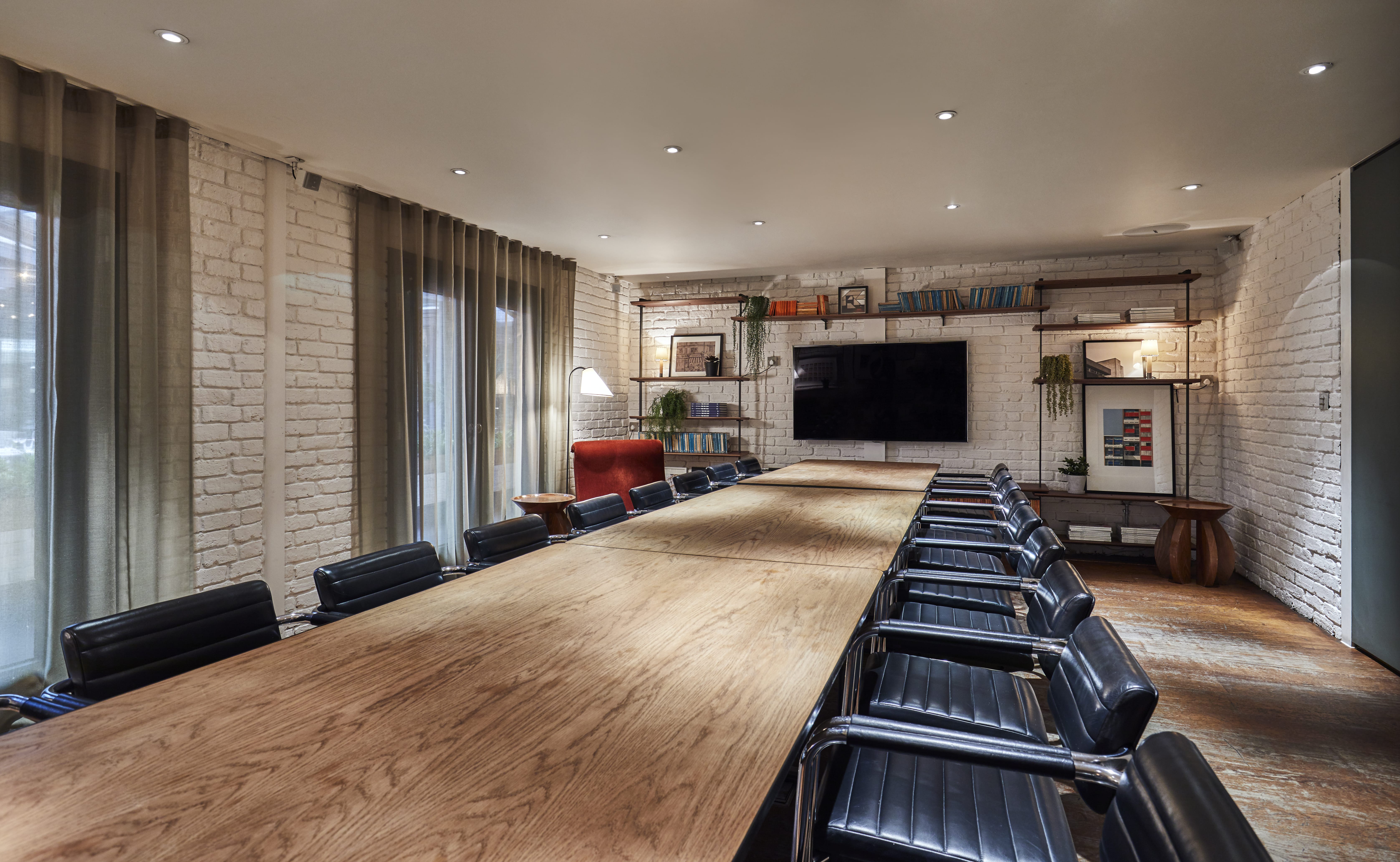 Modern conference room in The Hoxton Shoreditch, ideal for meetings and presentations.