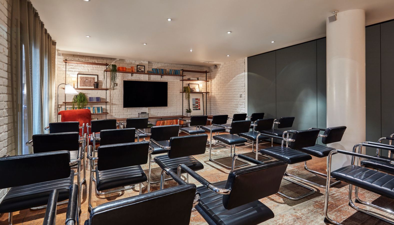 Modern meeting room in The Hoxton Shoreditch, ideal for workshops and brainstorming sessions.