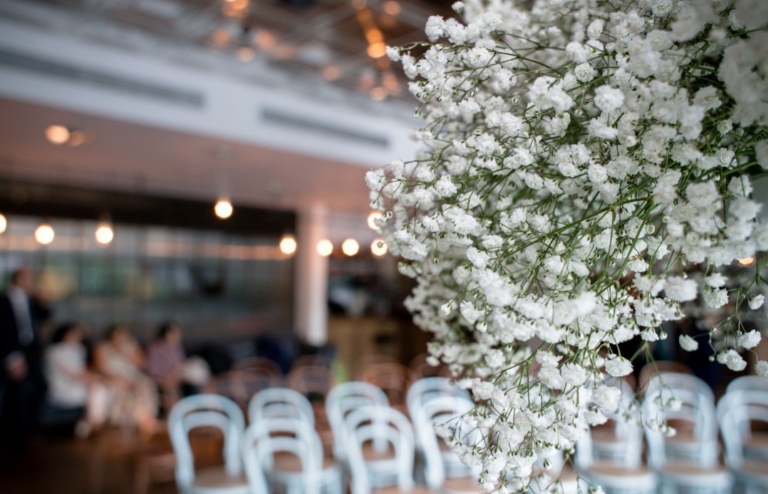 Elegant event space at The Pearson Room with floral decor for networking.