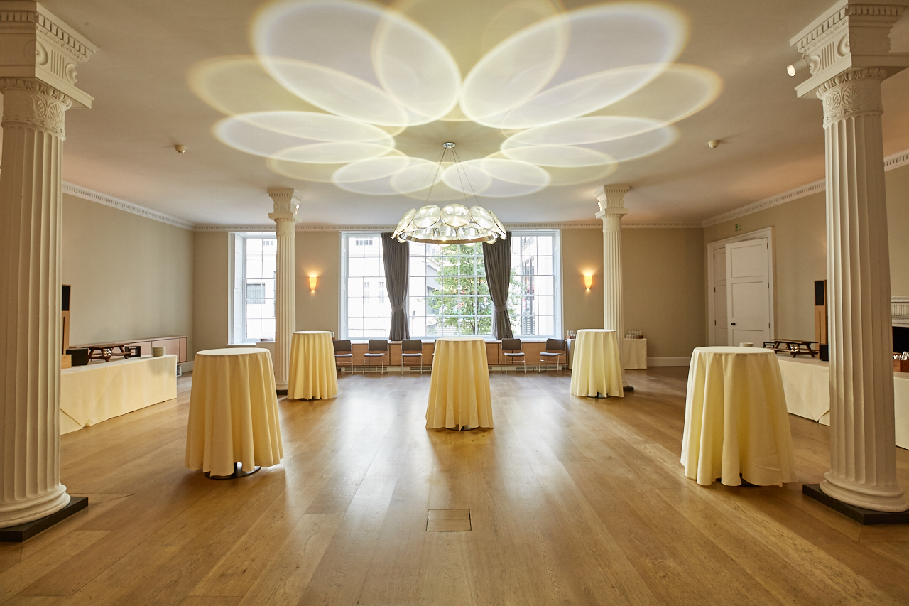 Elegant Benjamin Franklin Room with unique ceiling, ideal for networking events and receptions.