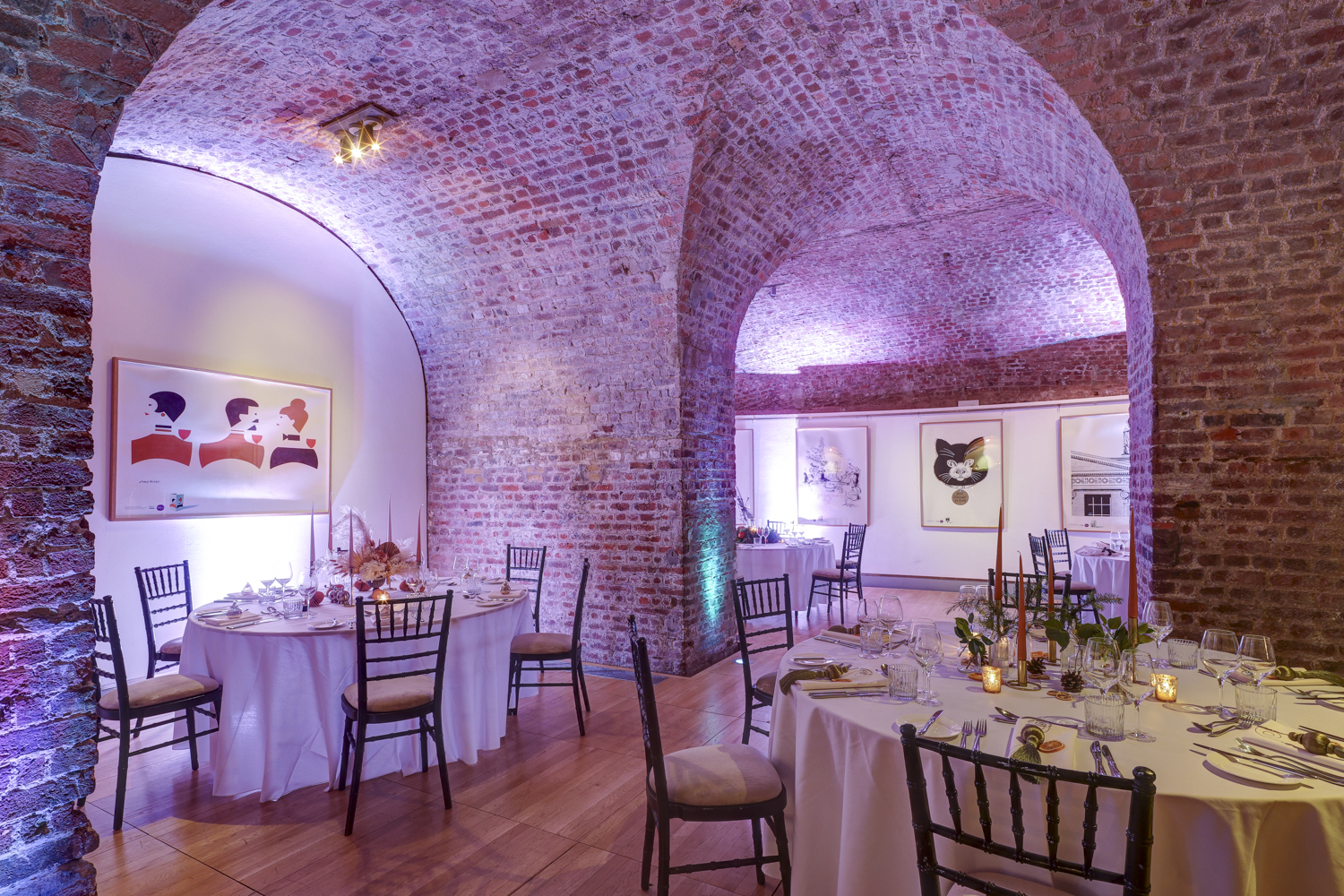 Elegant event space in RSA House with exposed brick arches, ideal for corporate gatherings.