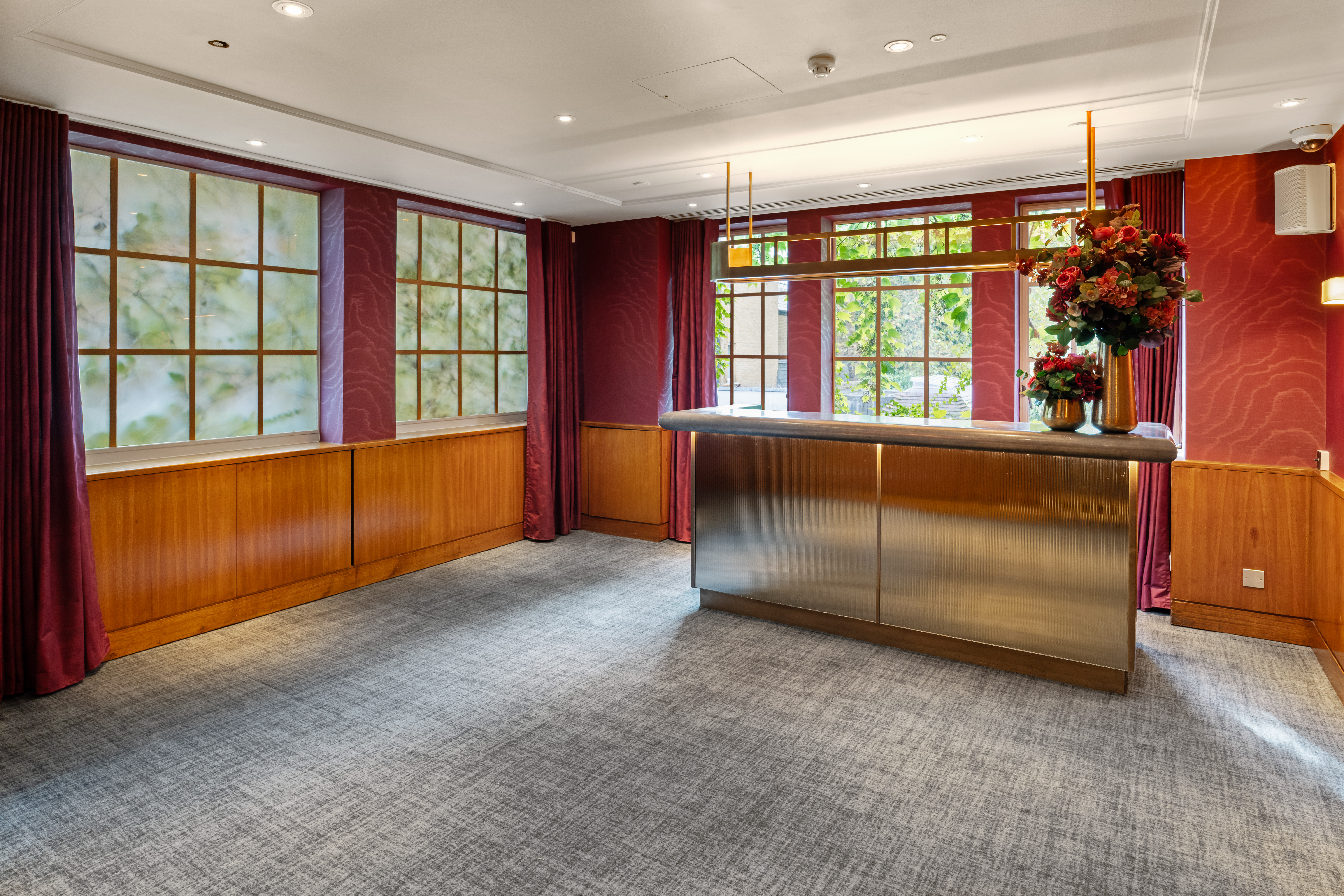 Beaufort Room at Bluebird Chelsea: elegant event space with natural light and warm wood accents.