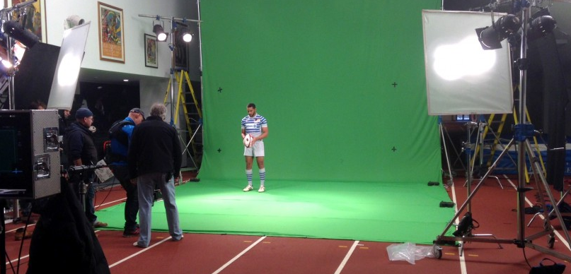 Model in sports attire at The Olympic Bar, StoneX Stadium for event marketing photoshoot.