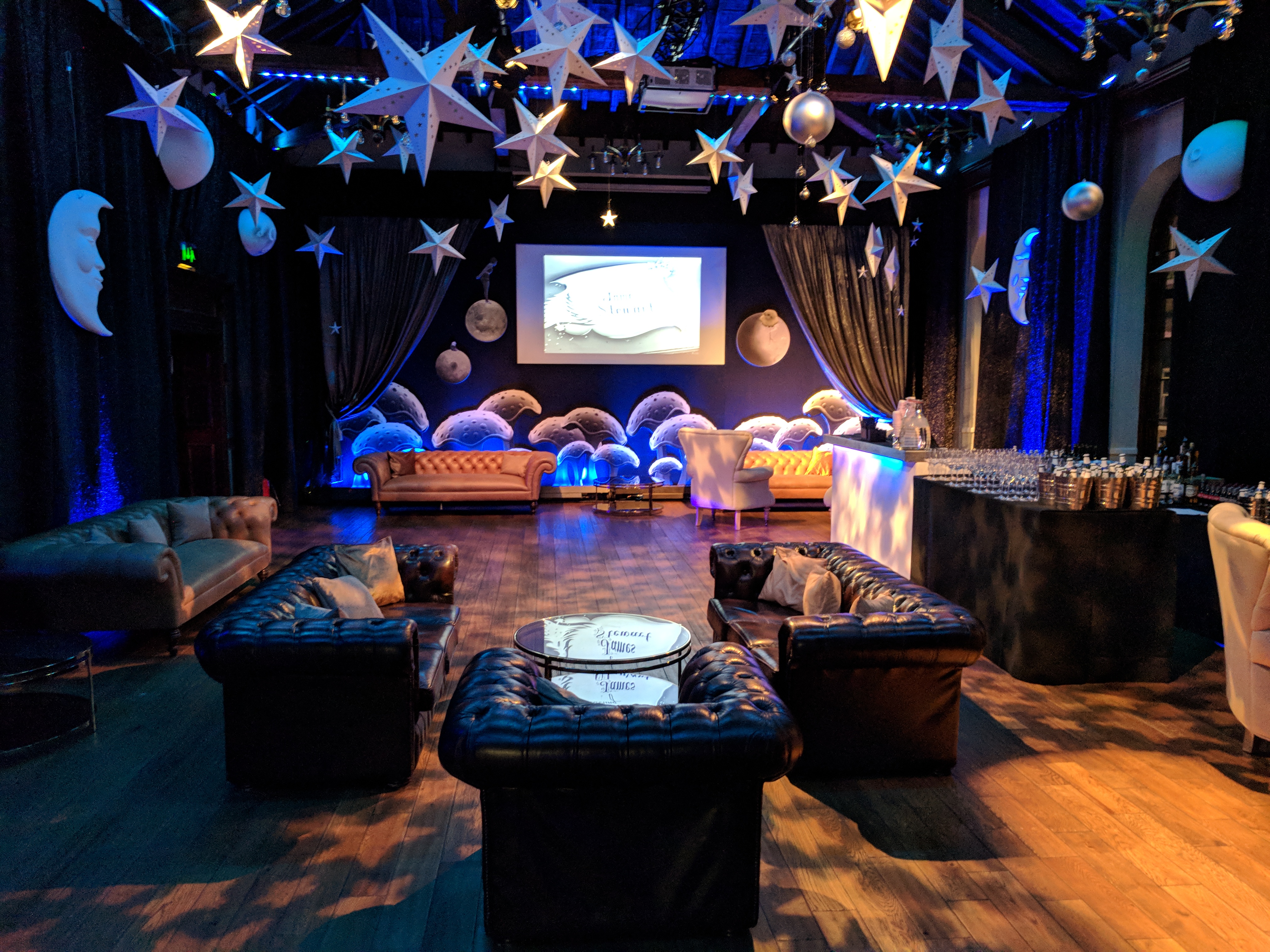 Elegant event space at The Sugar Rooms with celestial decor for networking and gatherings.