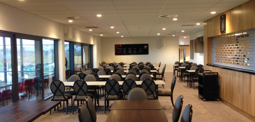 Modern Players Lounge at StoneX Stadium, ideal for meetings and workshops.