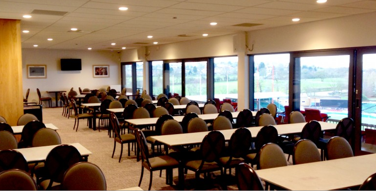 Spacious Players Lounge at StoneX Stadium, perfect for meetings and banquets.