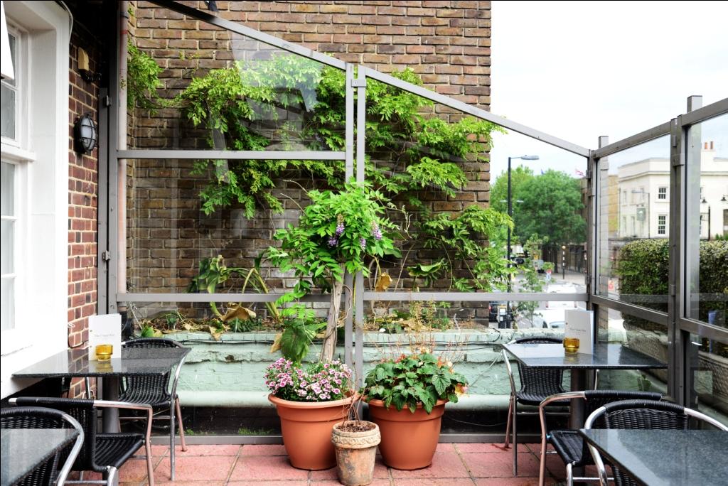 Charming outdoor terrace at The Chapel Bar, perfect for intimate gatherings and events.