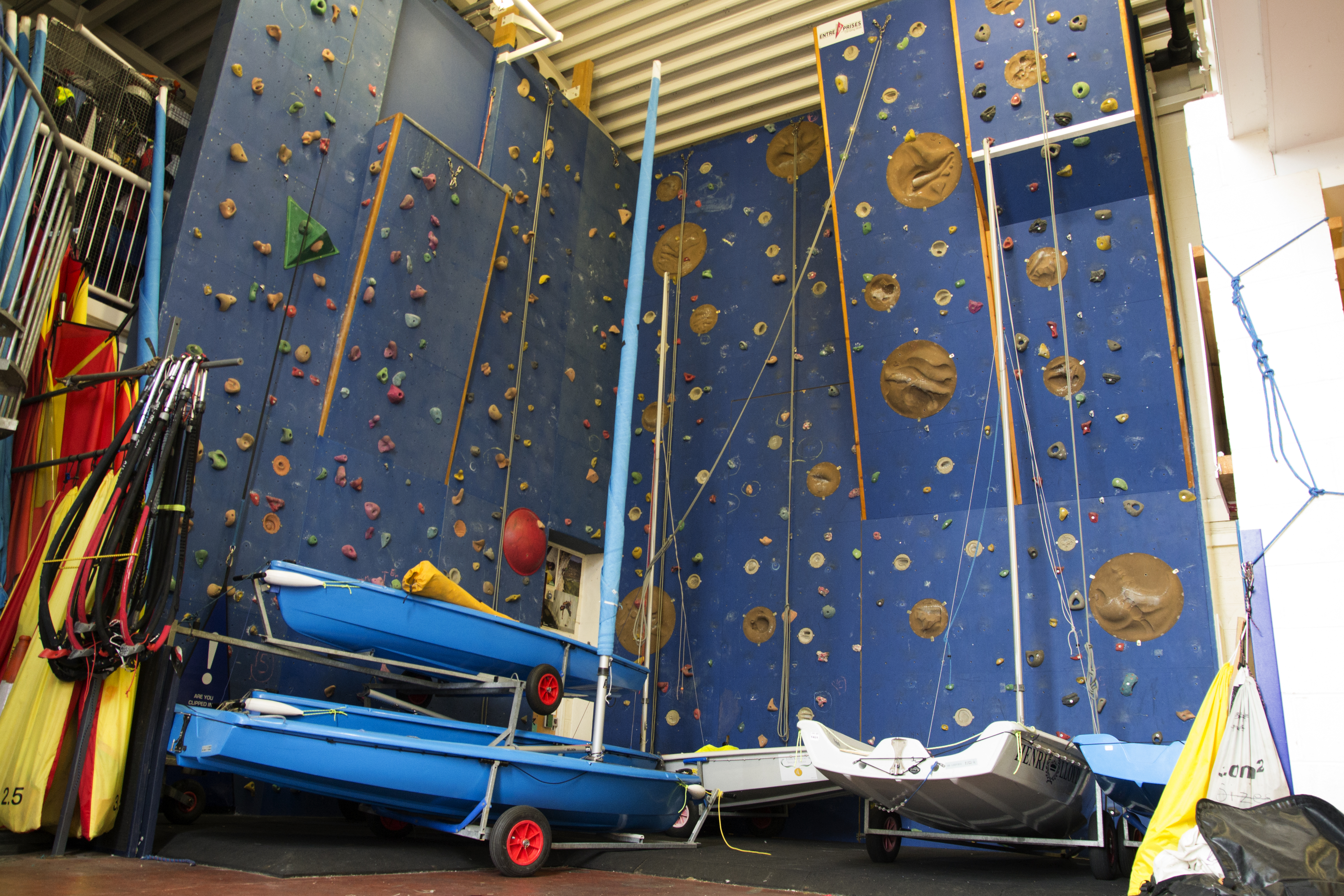 Indoor climbing wall at Helly Hansen Watersports Centre for team-building events.